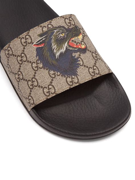 gucci sneakers with little wolves on it|Buy Gucci GG Supreme Slide 'Wolf' .